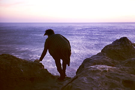 person on edge of cliff