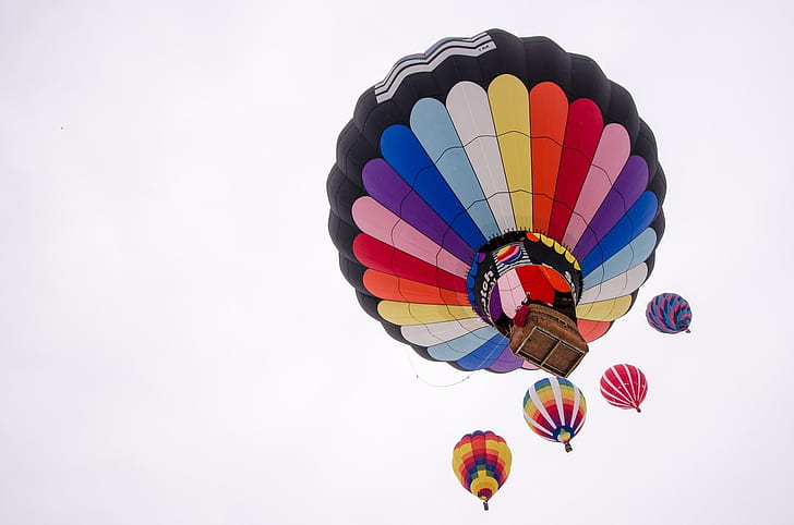 low-angle photography of multicolored hot air balloons