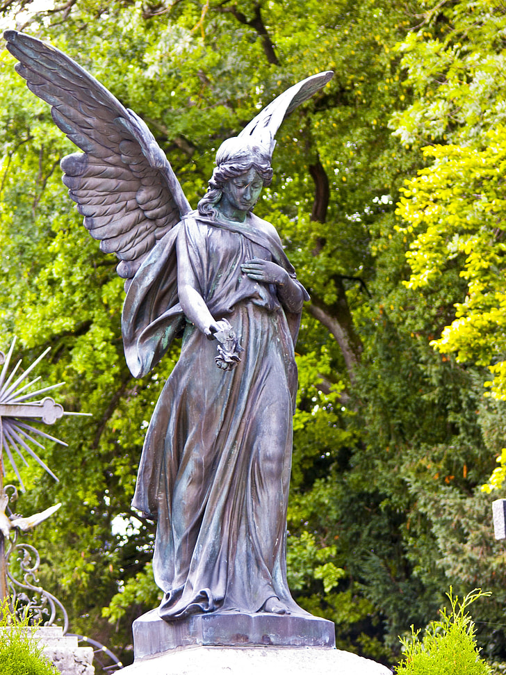 photography of angel concrete statue