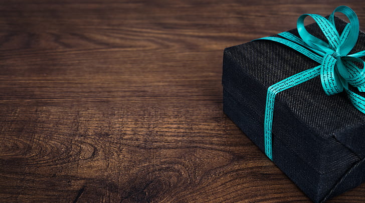 black gift box with blue ribbon