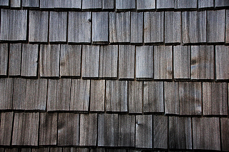 closeup photo of brown roof tiles
