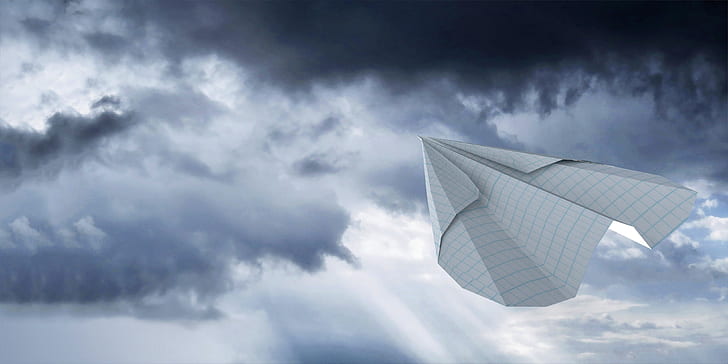 closeup photo of paper airplane