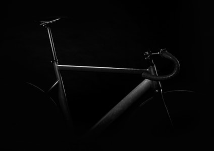 gray triathlon bicycle in dark room