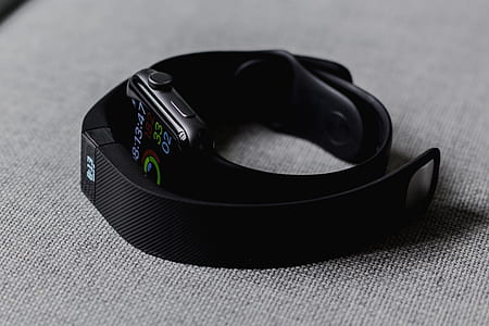 space black aluminum case Apple Watch with black Sport Band and black Fitbit Flex