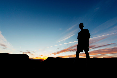 man silhouette during sunrise