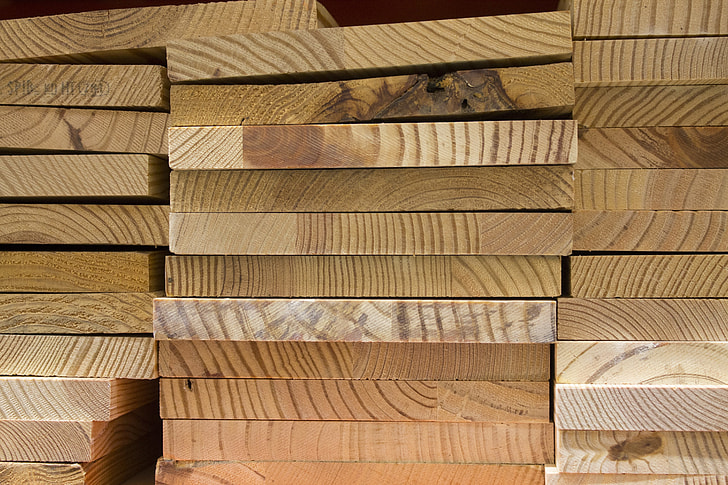 pile of brown wood planks