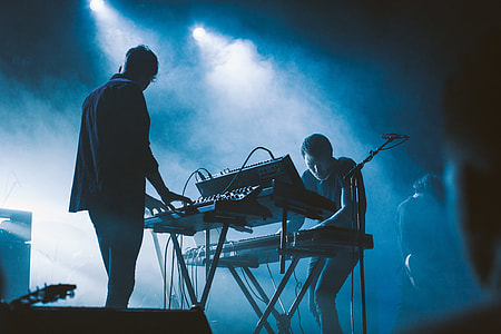 photo of two people using instruments
