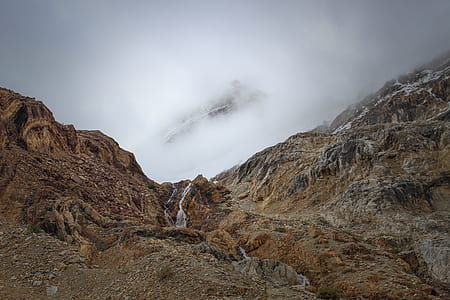 photography of mountain surrounded by mist