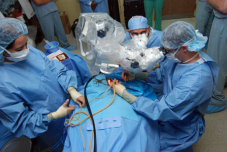 nurses and doctor doing surgery