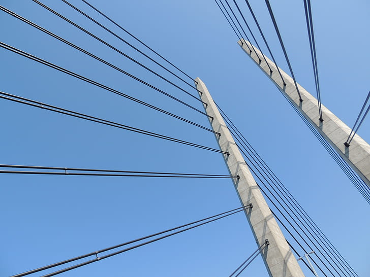 photo of white suspension bridge