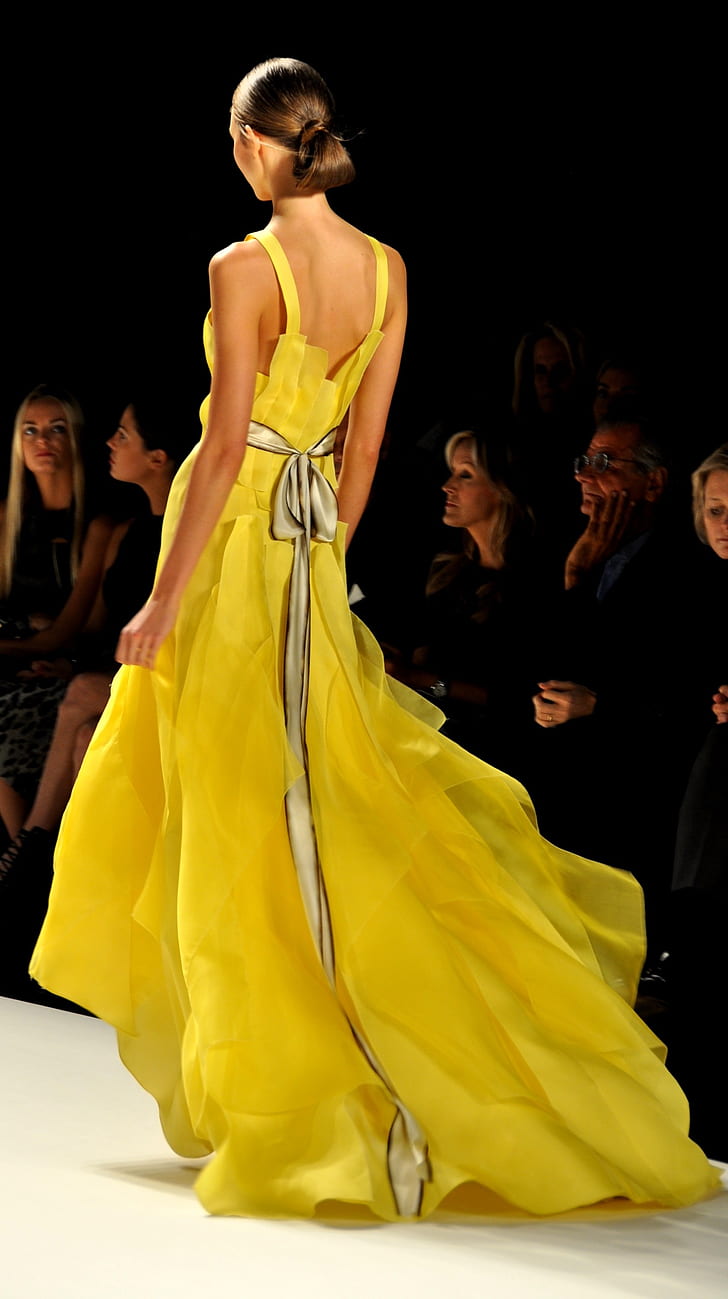 woman wearing yellow sleeveless long dress