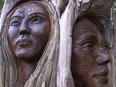 man and woman tree carving photo