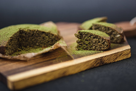 Delicious homemade matcha cake on a wooden board