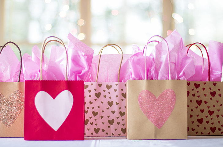 brown and red heart print paper bags