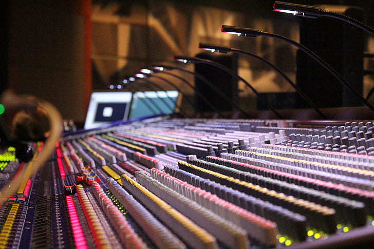 closeup photo of audio mixers