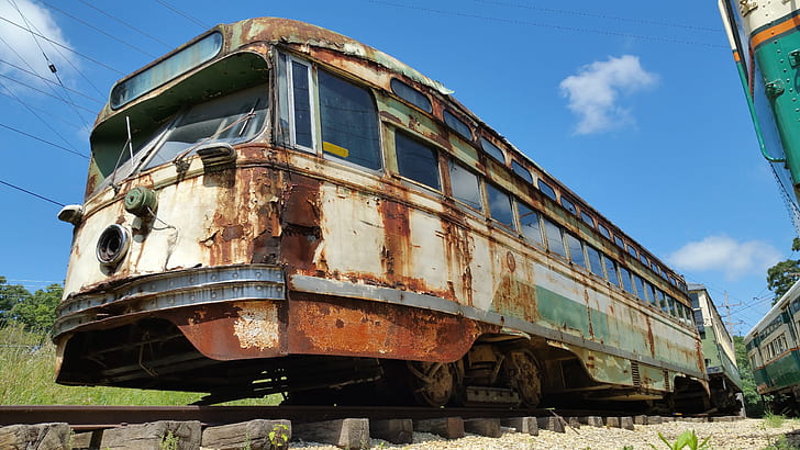 rusted white and gray train