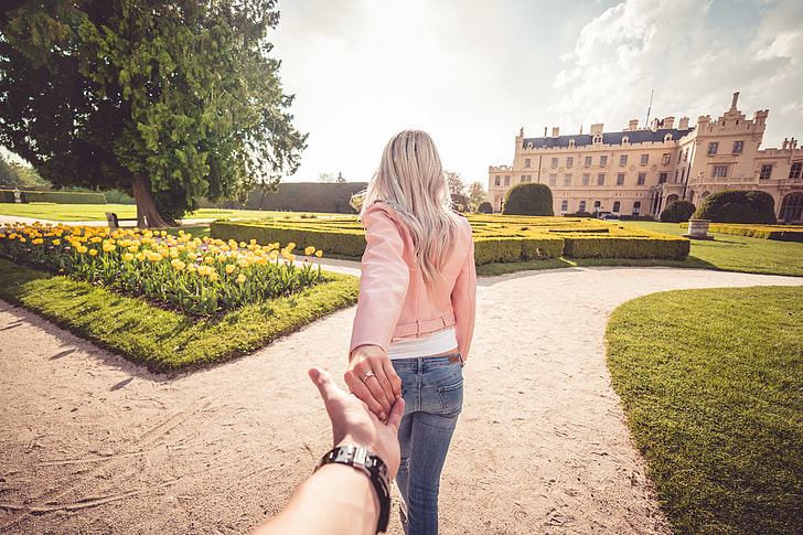 Young Couple Enjoys Walking in Chateau Garden #followmeto