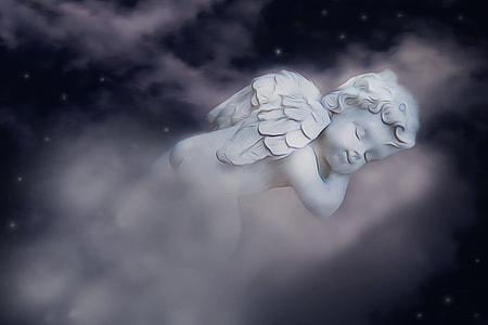 cherub sleeping on clouds