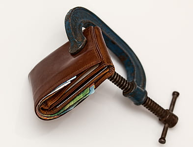 brown leather wallet clamp in C-clamp