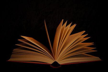book opened with black background