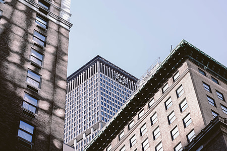 photo of three gray buildings