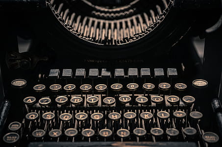 selective focus of black and gray typewriter