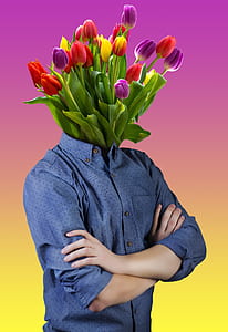 man wearing blue dress shirt with tulips flower bouquet head