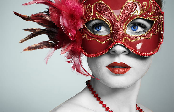 woman wearing red masquerade mask