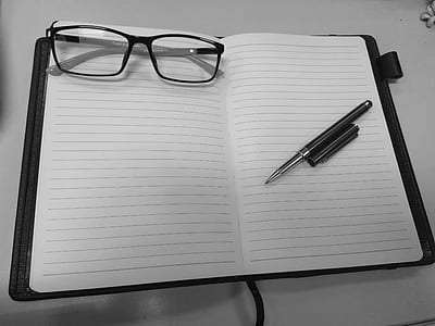 eyeglasses on notebook