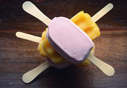 stack yellow and purple Popsicle