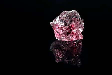 selective focus photographed of pink crystal