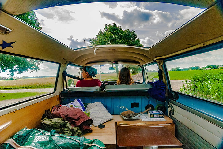 two women inside van