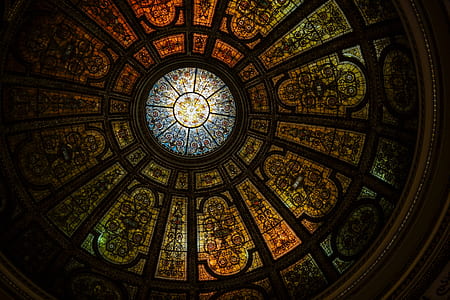 round black and gold stained glass dome building interior