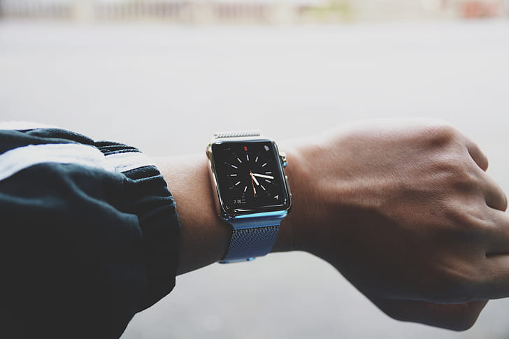 Royalty-Free photo: Silver Apple Watch with silver milanese strap | PickPik