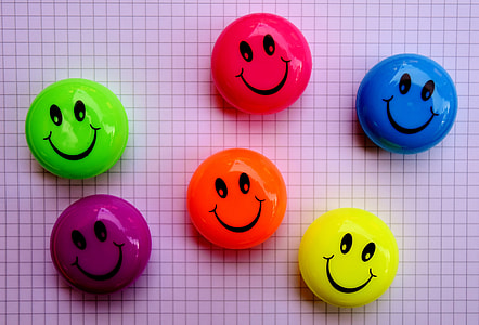 six assorted-color smiley decors