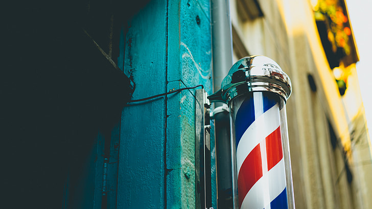 white, red, and blue barber pole