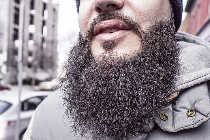 closed photography of man beard