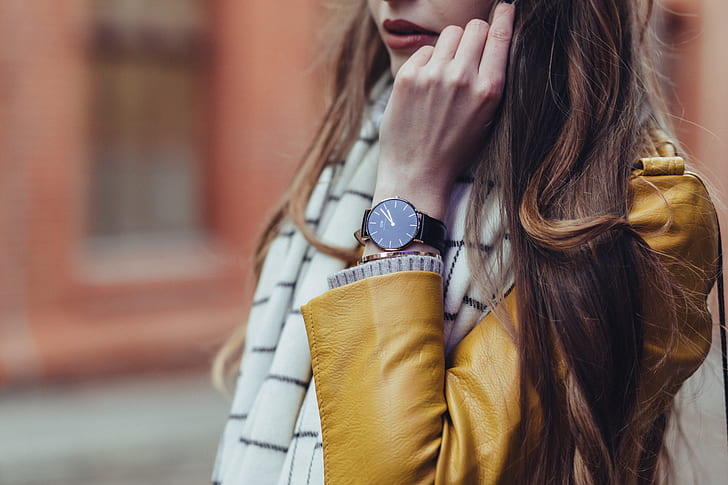 woman wearing black wrist watch