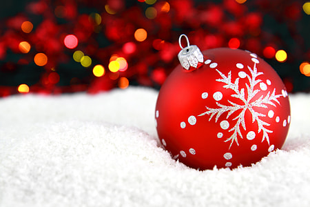 selective photo of red and white Christmas bauble