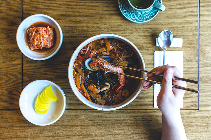 Eating Korean seafood stew