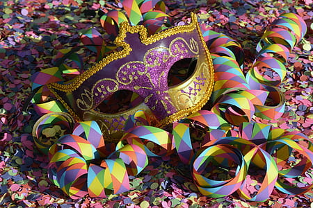 purple and gold masquerade mask