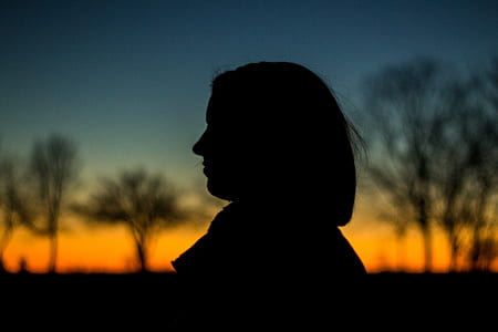 Silhouette of a Person during Sunset