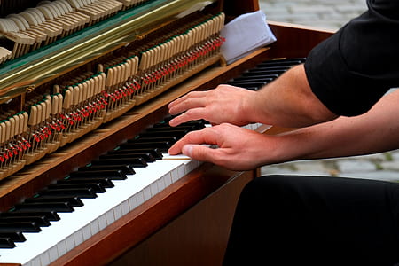 Person Playing Piano Photo