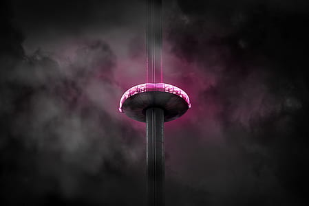 tower with pink and grey lighted disc