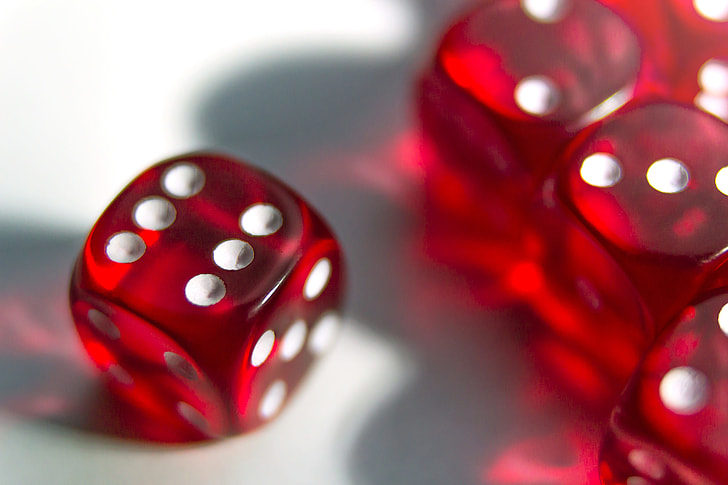 Closeup shot of red playing dice game