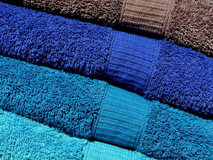 assorted-color folded bath towels