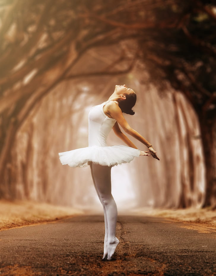 ballerina on concrete road