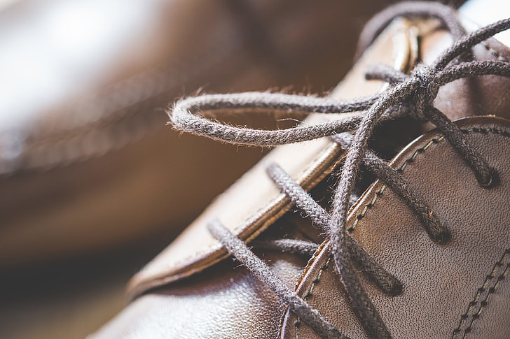 Royalty-Free photo: Brown Leather Shoes Shoelaces Close Up | PickPik