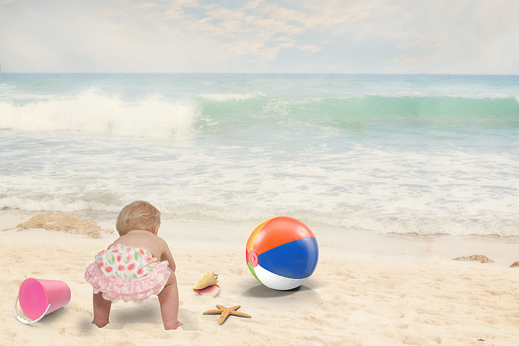 edited photo of baby on beach during daytime