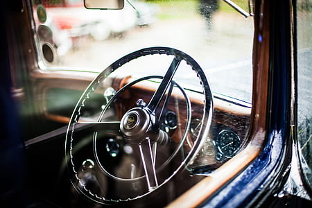 Grey Car Steering Wheel during Daytime
